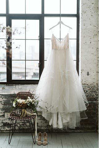 Image 1 - Minimal + simple wedding inspiration – hanging floral centerpiece, donut cake + stunning haley paige gown! in Styled Shoots.