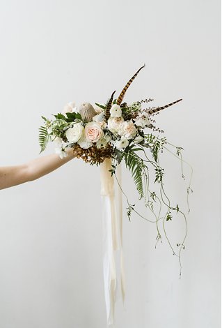 Image 4 - Minimal + simple wedding inspiration – hanging floral centerpiece, donut cake + stunning haley paige gown! in Styled Shoots.