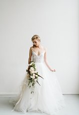 Image 9 - Minimal + simple wedding inspiration – hanging floral centerpiece, donut cake + stunning haley paige gown! in Styled Shoots.
