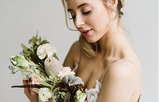 Image 10 - Minimal + simple wedding inspiration – hanging floral centerpiece, donut cake + stunning haley paige gown! in Styled Shoots.