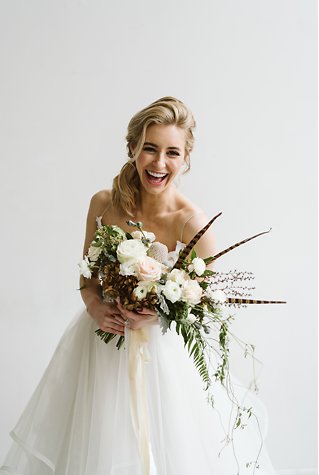 Image 11 - Minimal + simple wedding inspiration – hanging floral centerpiece, donut cake + stunning haley paige gown! in Styled Shoots.
