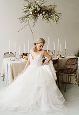 Image 20 - Minimal + simple wedding inspiration – hanging floral centerpiece, donut cake + stunning haley paige gown! in Styled Shoots.