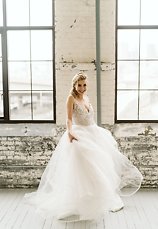 Image 24 - Minimal + simple wedding inspiration – hanging floral centerpiece, donut cake + stunning haley paige gown! in Styled Shoots.