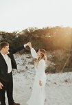 Image 24 - Intimate Beach Elopement full of Modern Boho vibes – Florida Sunset Wedding in Real Weddings.
